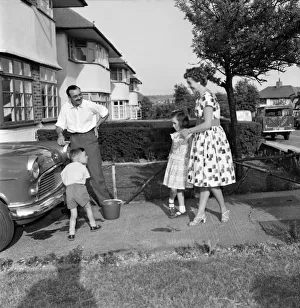 Family at home: Mr. and Mrs. Atkins, (Christian names Thelma and Derek