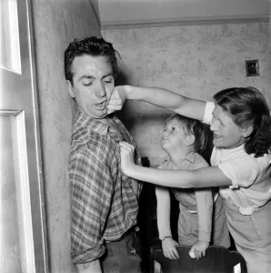Familys: Voilence. Stuntman Steve Donohue seen here having a Mock Fight with his daughter