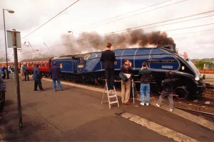 Carriages Prints: The famous old steam locomotive Sir Nigel Gresley powers its way through Morpeth Station