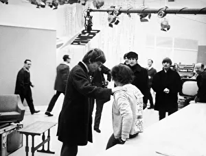 Beatlemania Prints: Fan accosts George Harrison of The Beatles at Teddington TV Studios
