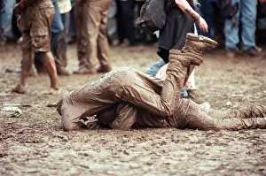 Fans covered in mud, at Margam Park to watch Catatonia performing, South Wales