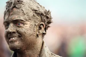 Fans covered in mud, at Margam Park to watch Catatonia performing, South Wales