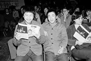Wall Prints: Fans, holding their programme, enjoy the performance of George Michael