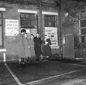 Queuing Prints: Fans queue at Old Trafford for tickets to see Manchester United verses Sheffield