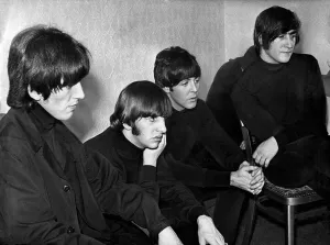Group Shot Prints: While the fans scream, the Beatles sit calmly backstage - watching themselves