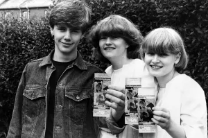 Fans of Singer David Bowie, proudly show off their tickets for his upcoming Murrayfield