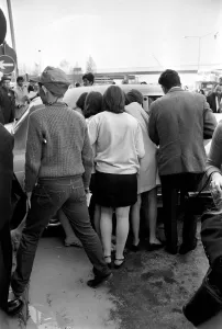 Frenzy Prints: Fans watching the Rolling Stones leaving London Heathrow after arriving from Athens