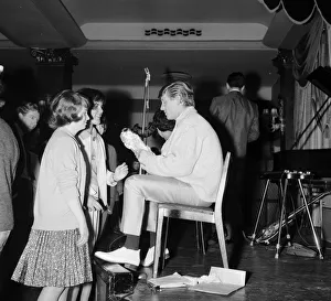 Fans welcome the return of pop singer Johnny Leyton at a fan club concert at the Empire