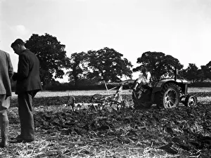 Ploughing Prints: A farmer and his Fordson N9 tractor seen here competing in the annual Forest of Arden