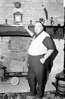 00049 Prints: Farmer and his hay hay rustling. February 1975 75-00714-001