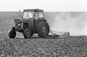 Drought Prints: Farmer Tony Mence with the dried up problems he faces on his land at Pershore during