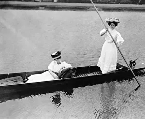Fashion of 1919 with women in Edwardian dress punting on a lake Clothing