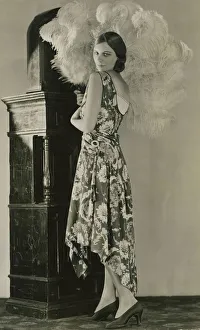Feather Prints: Fashion 1920s - September 1928 An evening gown of new soft taffeta in dark blue