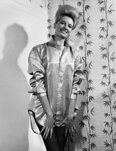 00031 Prints: Fashion 1960 s. Man, its a gold shirt! The outfit worn so alluringly by