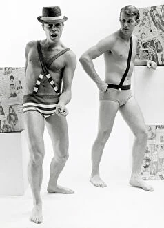 00196 Collection: Fashion in the 1960s male models wearing swimming trunks with braces