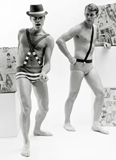 1960s Fashion Prints: Fashion in the 1960s male models wearing swimming trunks with braces