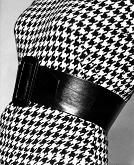 Checked Prints: Fashion August 1958 Model from 1950s wearing a checked body suit / bodice with a