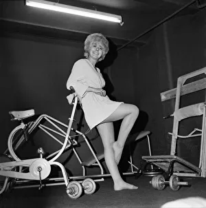 Fashion Clothing: Model 23-year-old Pat Smedley of Manchester models a blue dressing gown