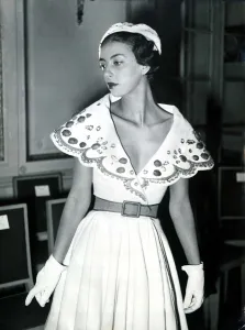 00181 Prints: Fashion clothing shoot March 1949 The new plunge neckline from Paris Plunging