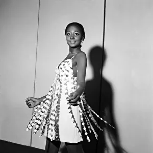 Fashion. Clothing: Tamara wearing a dress by Brenda Ring called Ecstatic