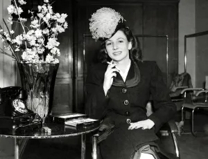 Fashion - Coat - August 1948 Black boucle coar with emphasis on the neck line