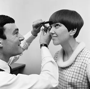 Hairdresser Prints: Fashion designer Mary Quant seen here having the finishing touches made to her new