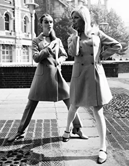Fashion by Elgee The long jacket of the trouser suit can be worn as a short top coat