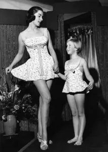 Fashion. My Fair Lady'is the name of these swimsuits with a pink floral