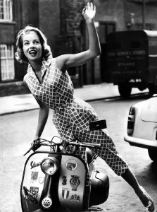 Scooter Prints: Fashion June 1957 Model from 1950s wearing a checked catsuit style outfit