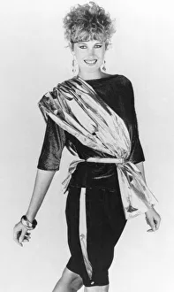 00031 Prints: Fashion - Misc. Shawls galore. If theres one thing to buy this autumn it
