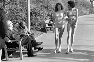 Afro Prints: Fashion scene from Woolworth s. Two old men sitting on a park bench distracted by