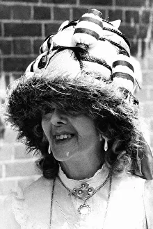 00180 Prints: Fashionable racegoer in bee hat at Royal Ascot in June 1983
