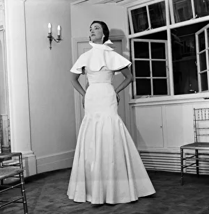 Gown Prints: Fashions by Lachasse Ltd. Desiree'A close-fitting evening-dress in heavy