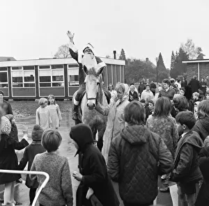 Father Christmas arrives on horseback at Woodley School 30th November 1968