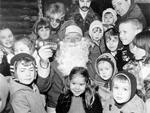 00515 Prints: Father Christmas in John Walker Square listening to the wishes of all the little children