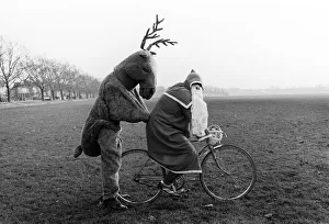 Father Christmas and Rudolf the Reindeer - bike stunt A©Mirrorpix circa 1980