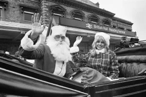 Carriage Prints: Father Christmas seen here arriving at Reading railway station to take part in Tutty