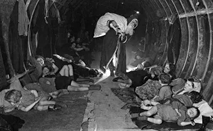 Father Christmas surprises children sheltering in the tunnels of London Underground