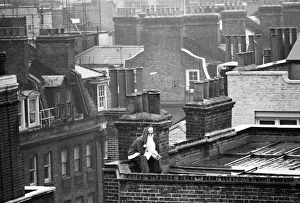 Escapes Prints: Father Christmas takes time out from his busy schedule for a quick cigarette break
