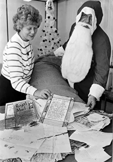 00529 Prints: Father Christmass helpers are working flat out at the Post Office replying to more