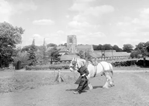 Monk Prints: Father Edmunds walks a shire horse through the fields at Mount Saint Bernard Monastery in