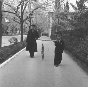Father and son seen here walking through the streets of Moscow carrying their daily catch