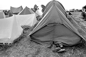 00087 Prints: Feet sticking out of a tent at the Isle of Wight Pop Festival 30th August 1969