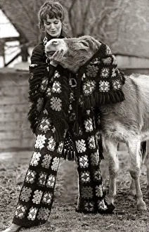 Flares Prints: A female model wearing a matching top and trousers with patterned crocheted squares