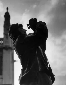 A female plane spotter on the look out for enemy aircraft in the City during the Second
