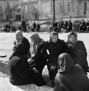 Russia Prints: Female residents of the Soviet town of Zagorsk sitting together talking as they gather in