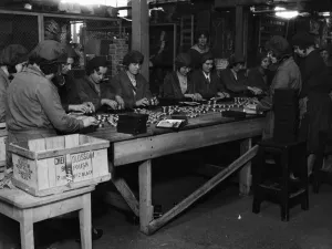 Overalls Prints: Female workers packing tins of Cherry Blossom boot polish at Cherry Blossom