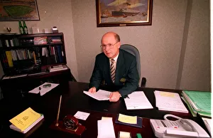FERGUS MCCANN CELTIC FC CHAIRMAN FOOTBALL CLUB SITTING AT DESK