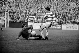 Division Two Prints: Ferguson No. 8 of Q. P. R. is stopped in his tracks by Sandercock No. 4 of Leicester City
