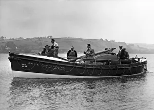 Carmarthen Bay Prints: Ferryside lifeboat Caroline Oates Aver and William Maine plunges away from her launching